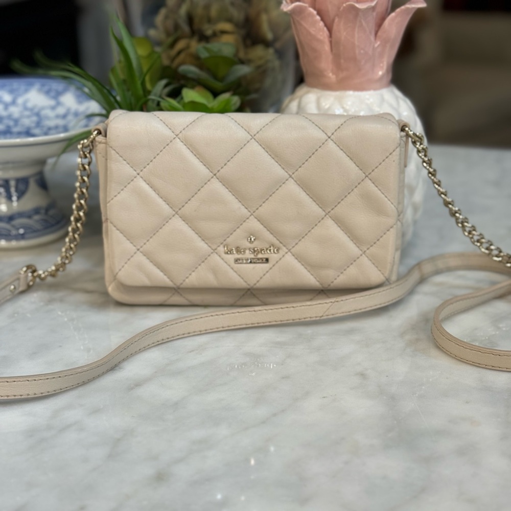 Kate Spade Cream Crossbody Bag with Sleek Design